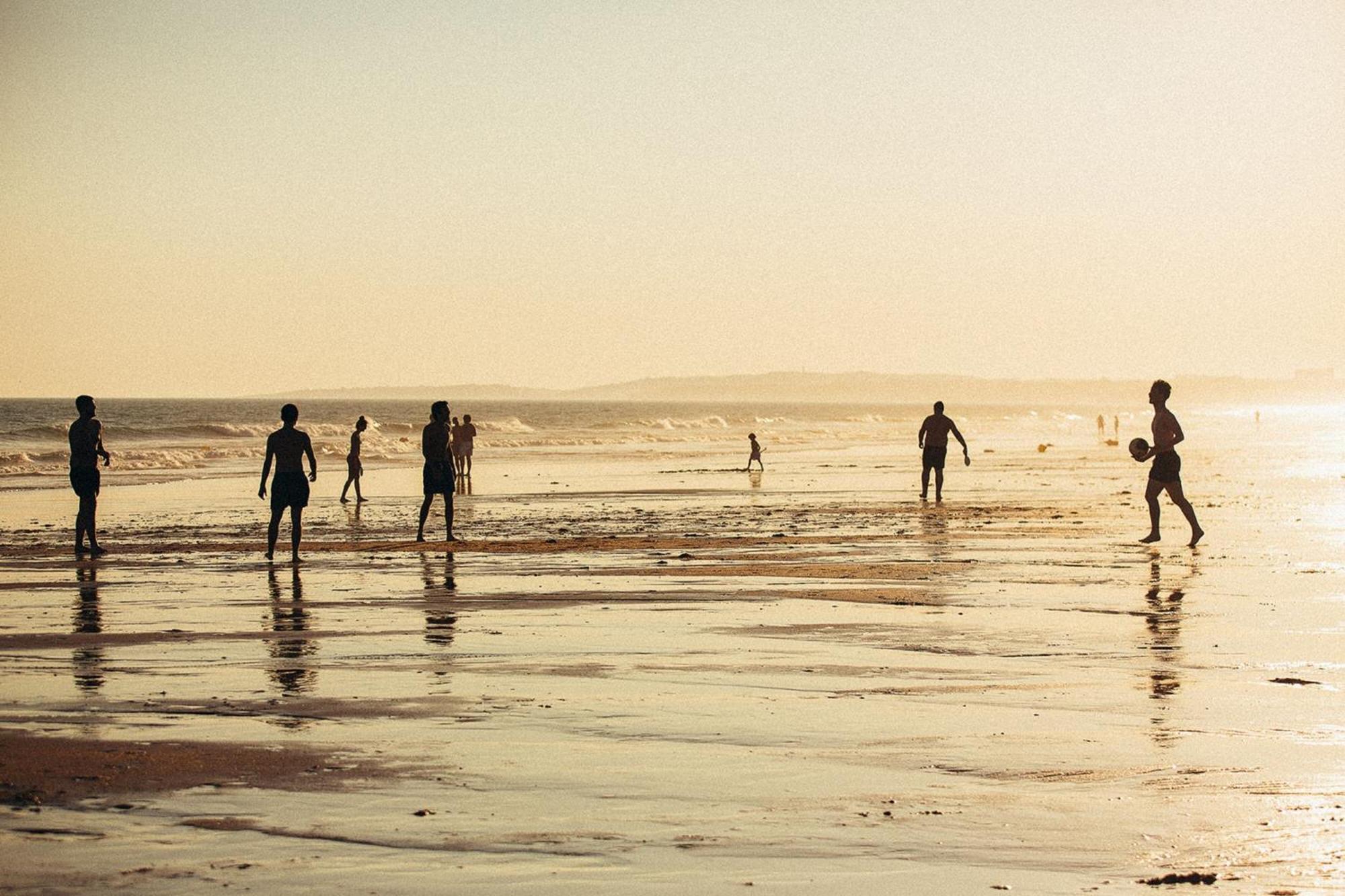 Domes Lake Algarve, Autograph Collection Vilamoura Eksteriør billede Children playing football on the beach